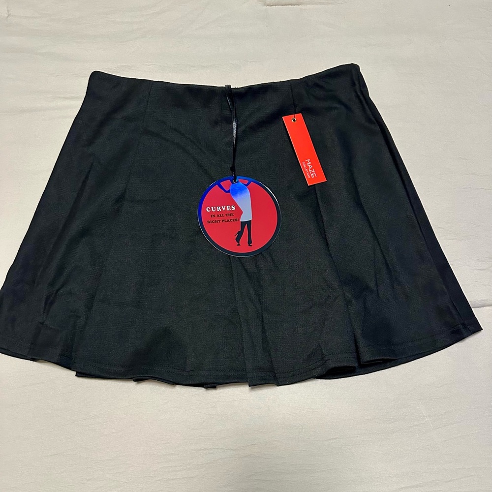 Black pleated tennis skort from the brand Maze Collection. NWT (L)